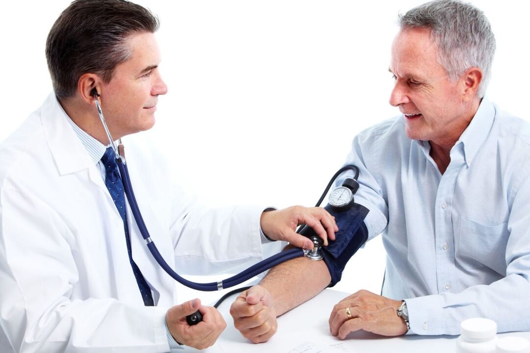The doctor measures the pressure of the hypertonic patient
